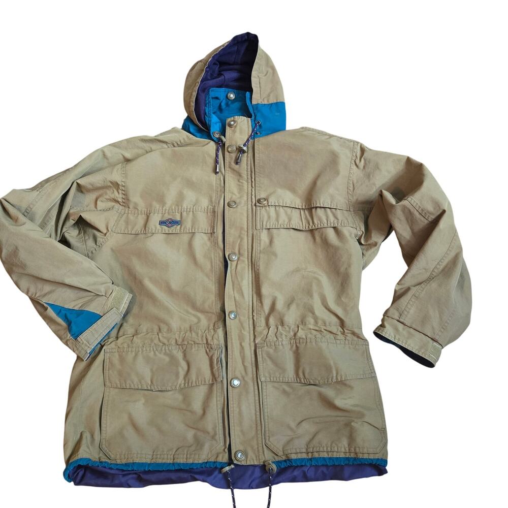 Vtg. Columbia khaki or tan colorway with blue trim men's size medium